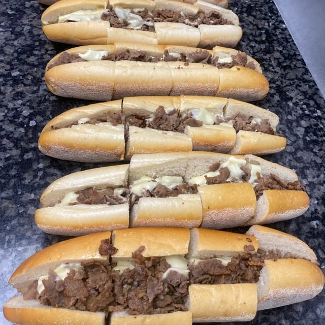 2 Cheesesteaks or Chicken Cheesesteaks & Small Fries.